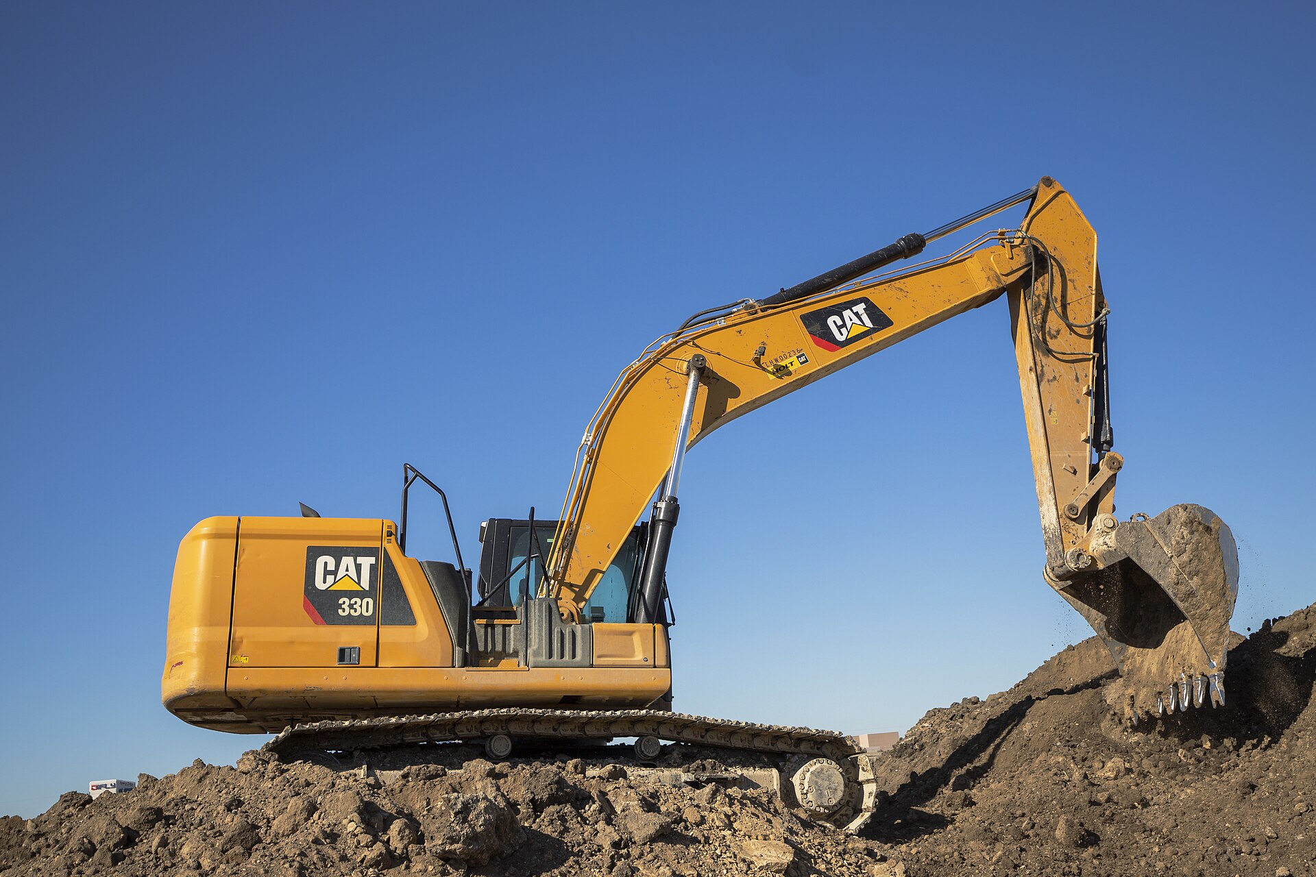 Caterpillar 330 hydraulic excavator working on earthworks