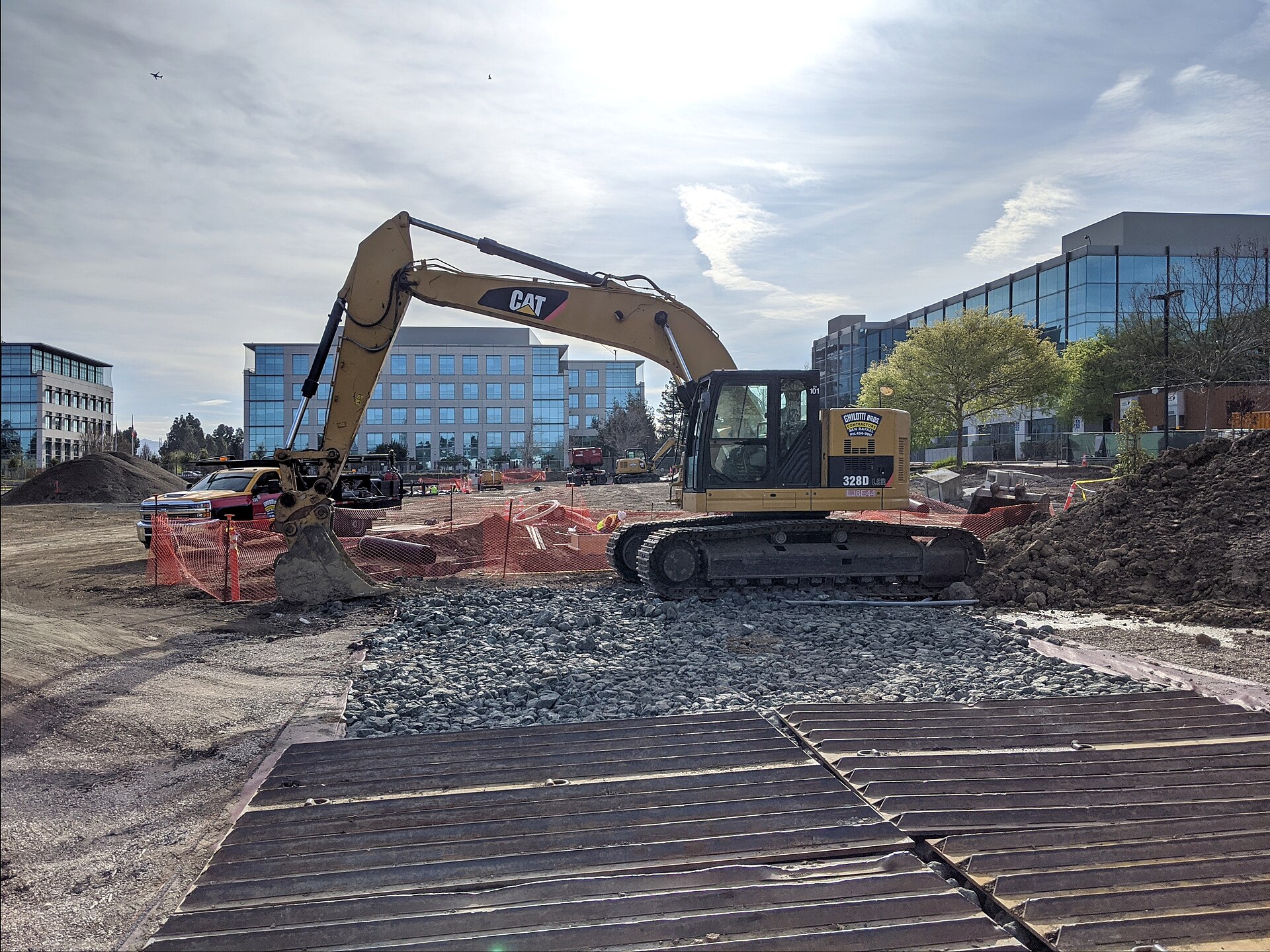 Caterpillar excavator operating on a commercial construction site